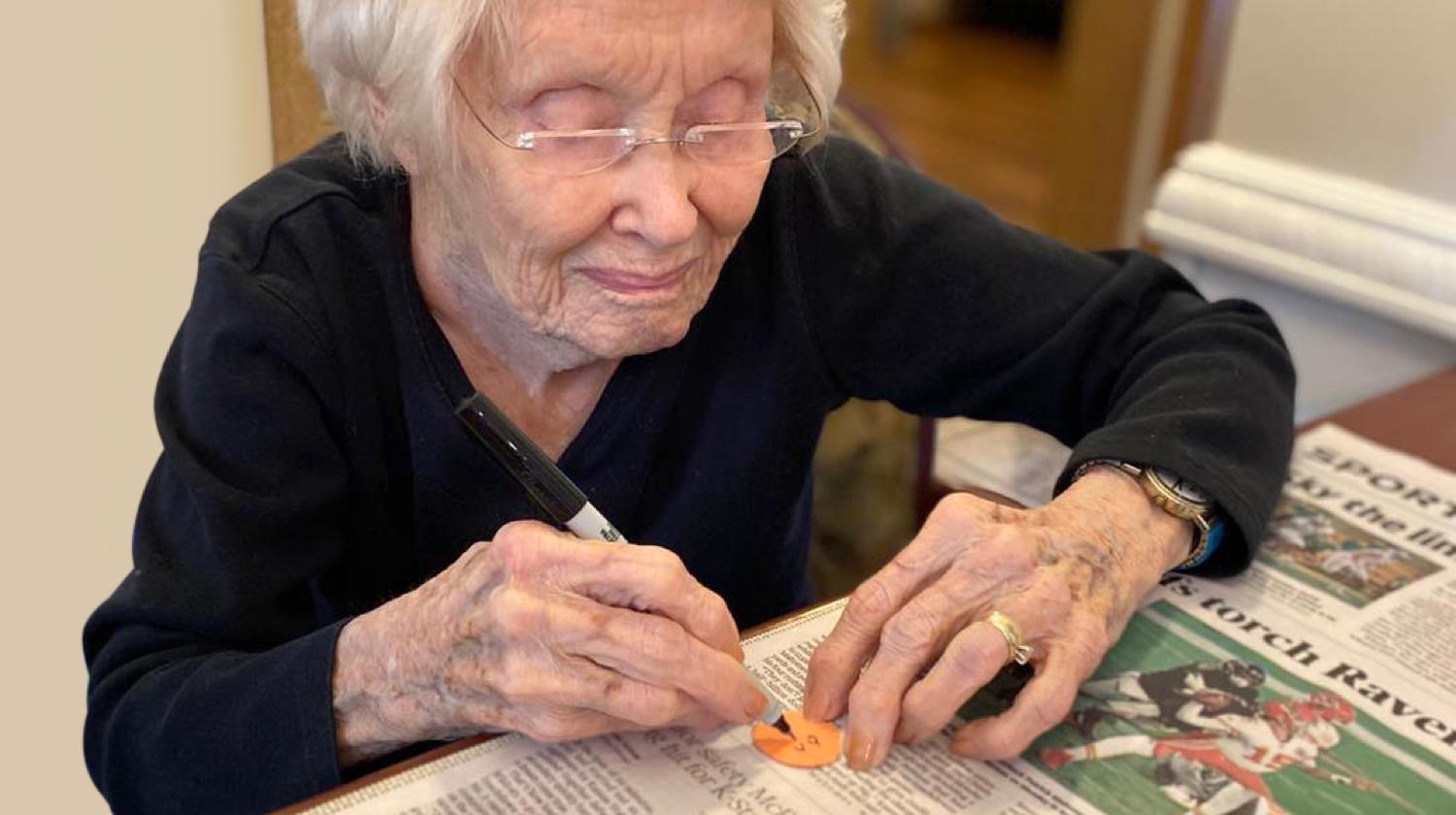Elderly woman and art project